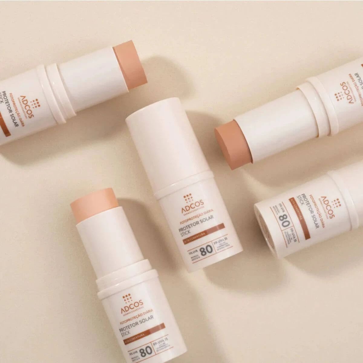 PROTETOR SOLAR ADCOS STICK FPS80 BEIGE 17G — imagem 5 | Farmácia Resyla